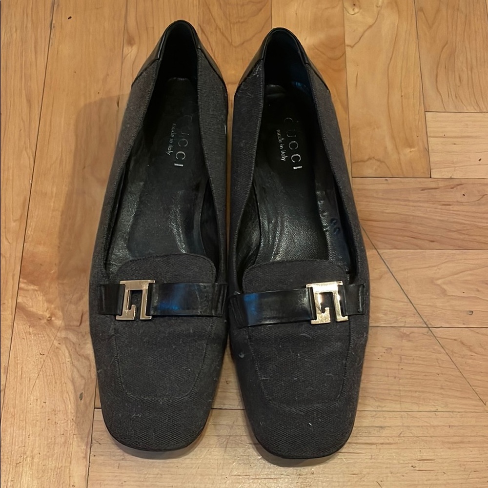Gucci Black Flats with Gold Hardware